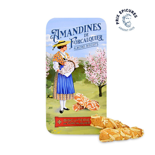 Biscuits aux amandes de Forcalquier en boîte métal décorée, spécialité provençale artisanale récompensée aux Prix Épicures.