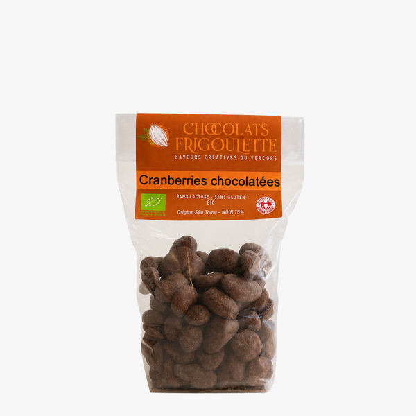 Cranberries enrobées de chocolat noir bio 75 %, sachet transparent avec étiquette Chocolats Frigoulette.
