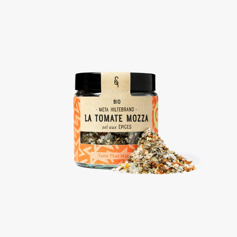Pot de sel aux épices bio « La Tomate Mozza », mélange coloré rouge, vert et blanc.