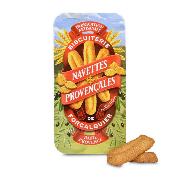 Navettes provençales artisanales de Forcalquier en boîte métal illustrée, biscuits traditionnels aux amandes et saveurs de Provence.