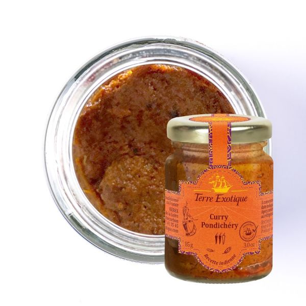 Curry de Pondichéry Terre Exotique en bocal, pâte d’épices orange-brun visible, texture épaisse présentée en vue de dessus.