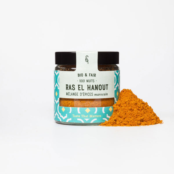Pot en verre Ras el hanout marocain bio SoulSpice, poudre orangée, étiquette bleu turquoise à motifs orientaux.