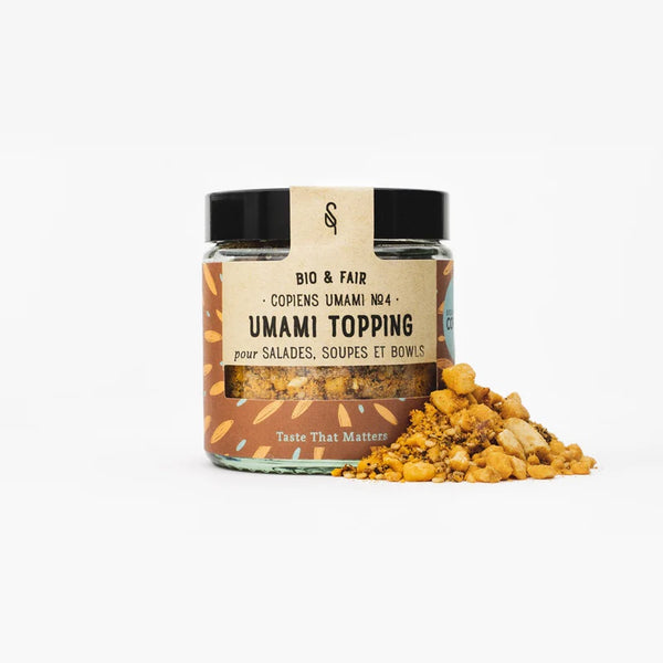 Topping umami bio SoulSpice, mélange croquant pour salades, soupes et bowls, présenté en pot en verre.
