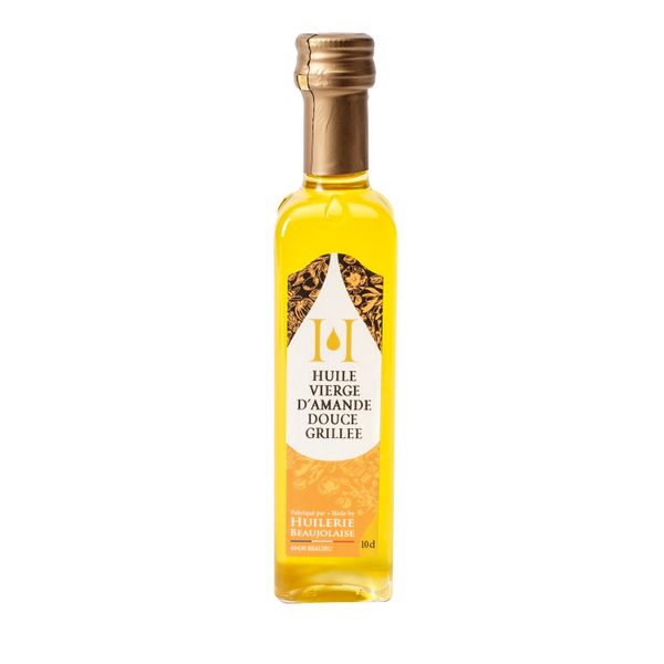 huile vierge d'amande douce grillée, produite par l'Huilerie Beaujolaise selon une méthode traditionnelle.  Bouteille de 10 cl.