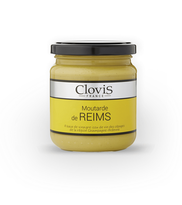 Pot de moutarde de Reims Clovis France, à la texture onctueuse et au goût raffiné. Étiquette jaune et argent indiquant une recette à base de vinaigre de Reims, idéale pour relever viandes et assaisonnements.